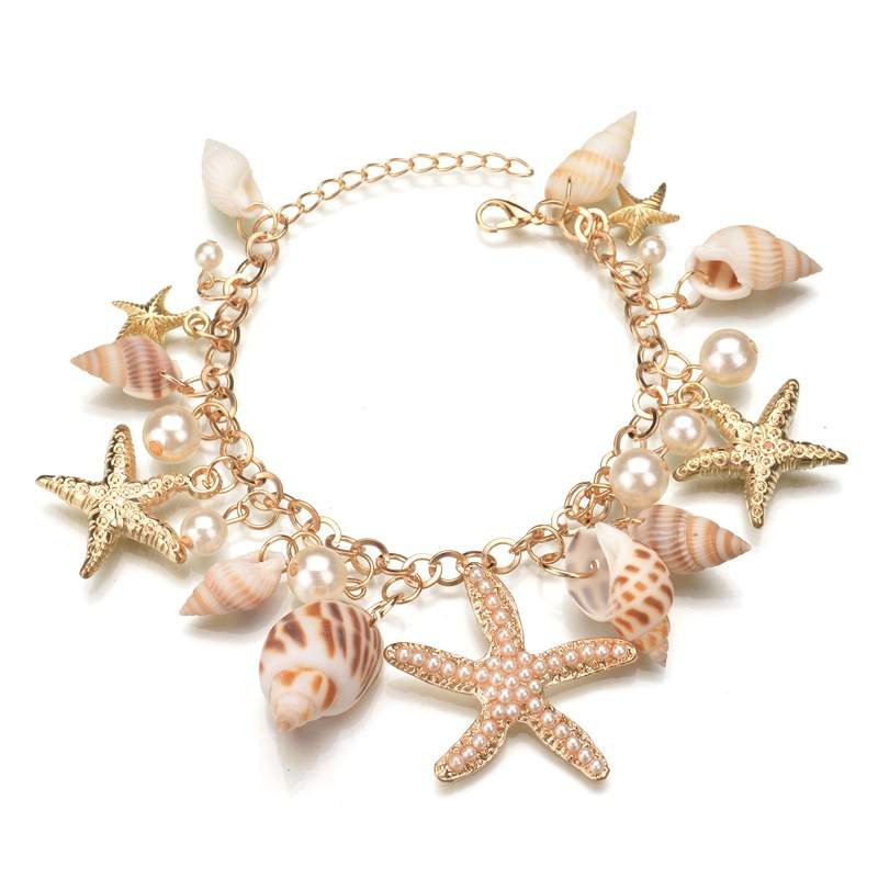 Marine-style metal bracelet with corals, starfish and shells – Bysimon  Group S.r.l.