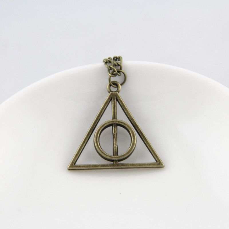 Buy Harry Potter Necklace Set 5 Pieces Cosplay Pendant Necklaces Time  Turner Deathly Hallows Golden Snitch for Girls Kids Decoration Toy Harry  Potter Fans Hogwarts Gifts or Decorations Online at desertcartEcuador