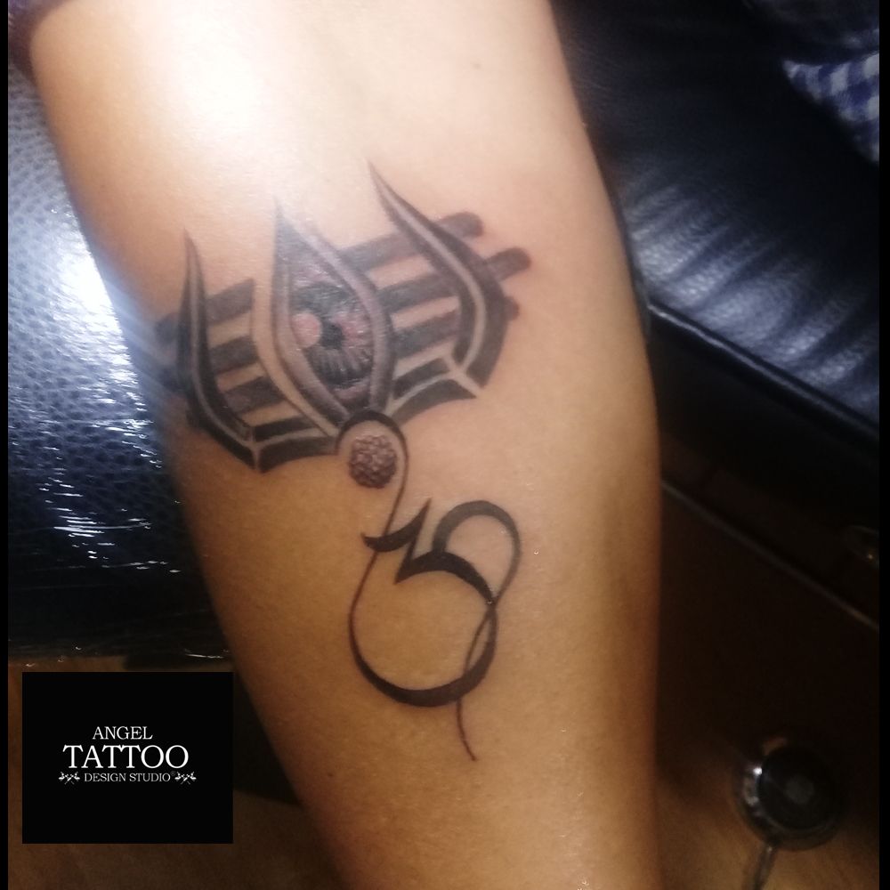 om and trishul tattoo